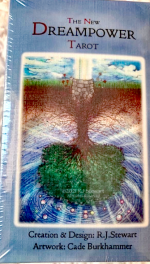 Box of Dreampower Tarot cards on quilt background