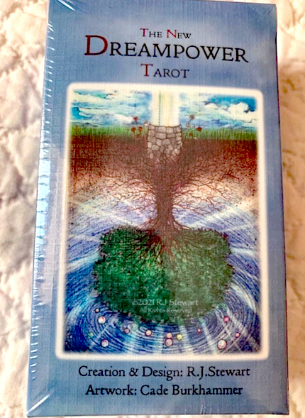 Box of Dreampower Tarot cards on quilt background