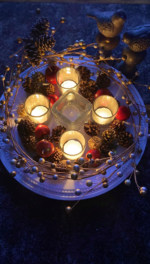 Four of five candles lit from 2020 Ceremony