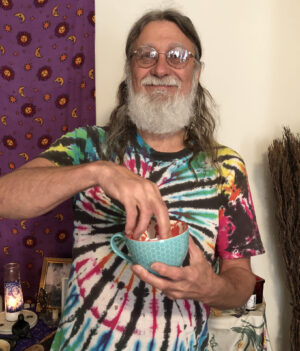 My husband John pulling the winners of International Tarot Day contestants 2021