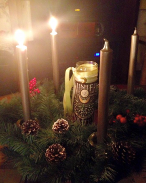 Personal photo from previous Solstice Sun Wreath participant two candles lit