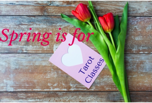 Spring is for Tarot classes with wooden table and red tulips