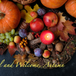 Welcome Autumn with fruitful bounty and candle