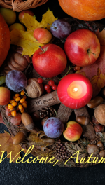 Welcome Autumn with fruitful bounty and candle