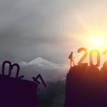 New year 2024 to 2025 written on the mountain top at sunrise