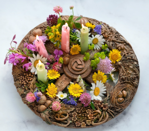 Flower wreath with candles for Litha