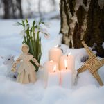 Brighid doll, cross, candles and snowdrops